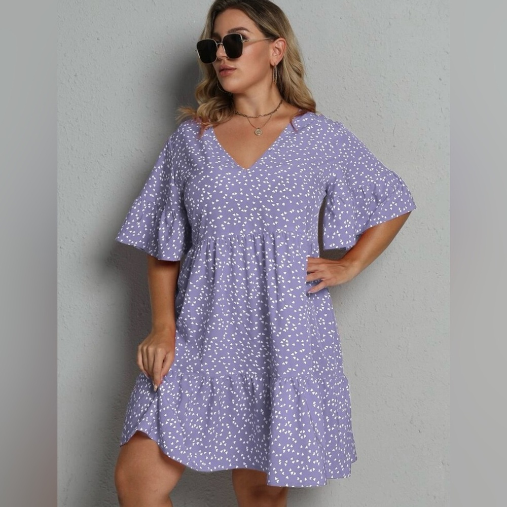 Very cute, flowy, light purple dress decorated with white hearts
